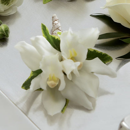 White Mini Cymbidium Boutonniere –  Maison Blooms, Wesley Chapel FL